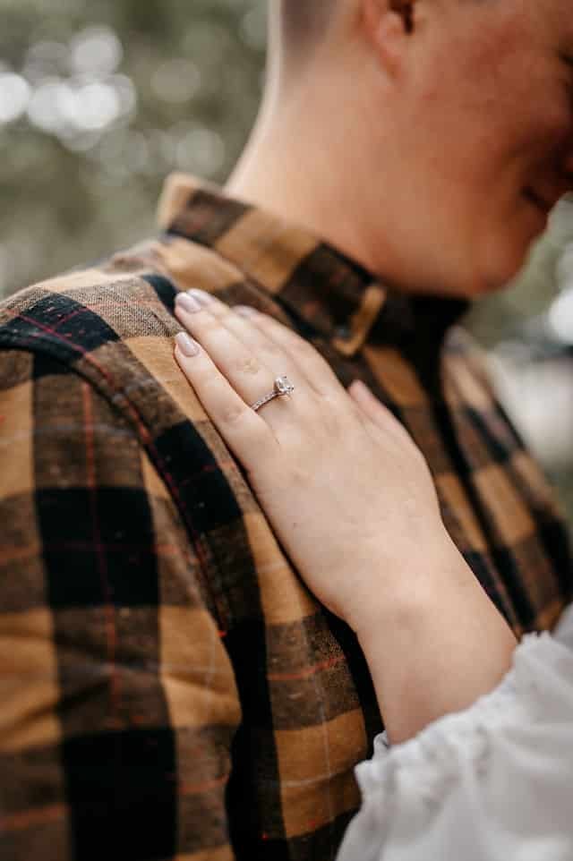 Close-up of an engagement ring on a bride-to-be’s hand captured by a Georgia wedding photographer.