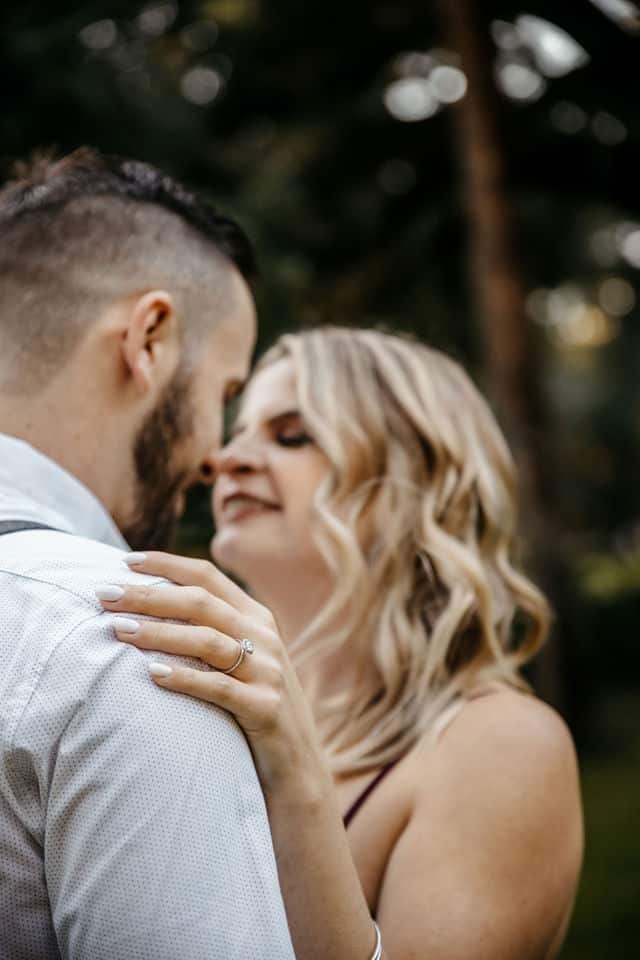 Close-up wedding portrait of a couple embracing captured by a Georgia wedding photographer.