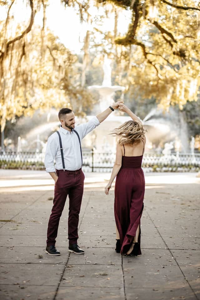 Couple dancing together outdoors during a Georgia wedding photography session.