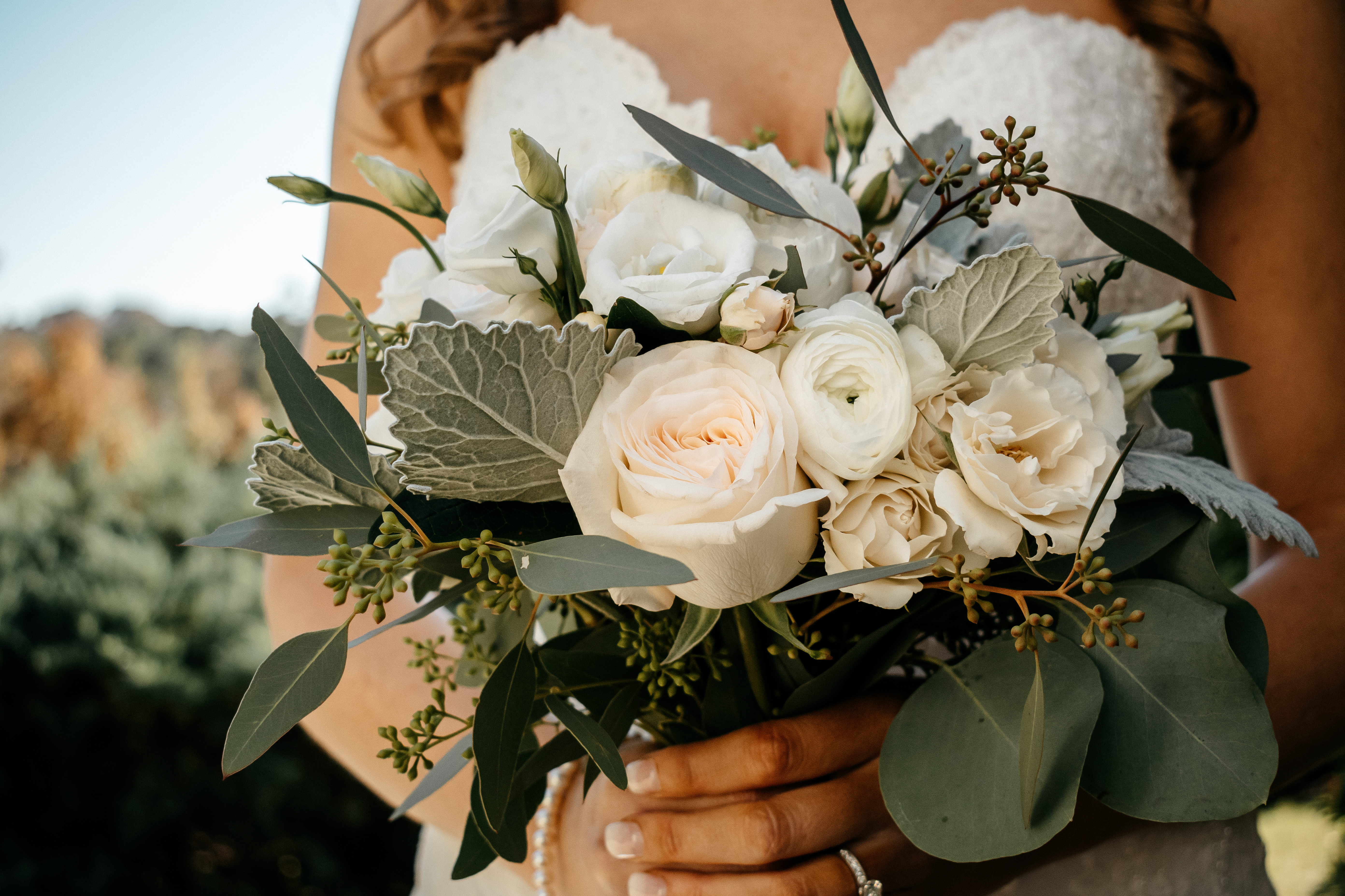 Bride holding a white wedding bouquet at a best wedding venue in Georgia. 