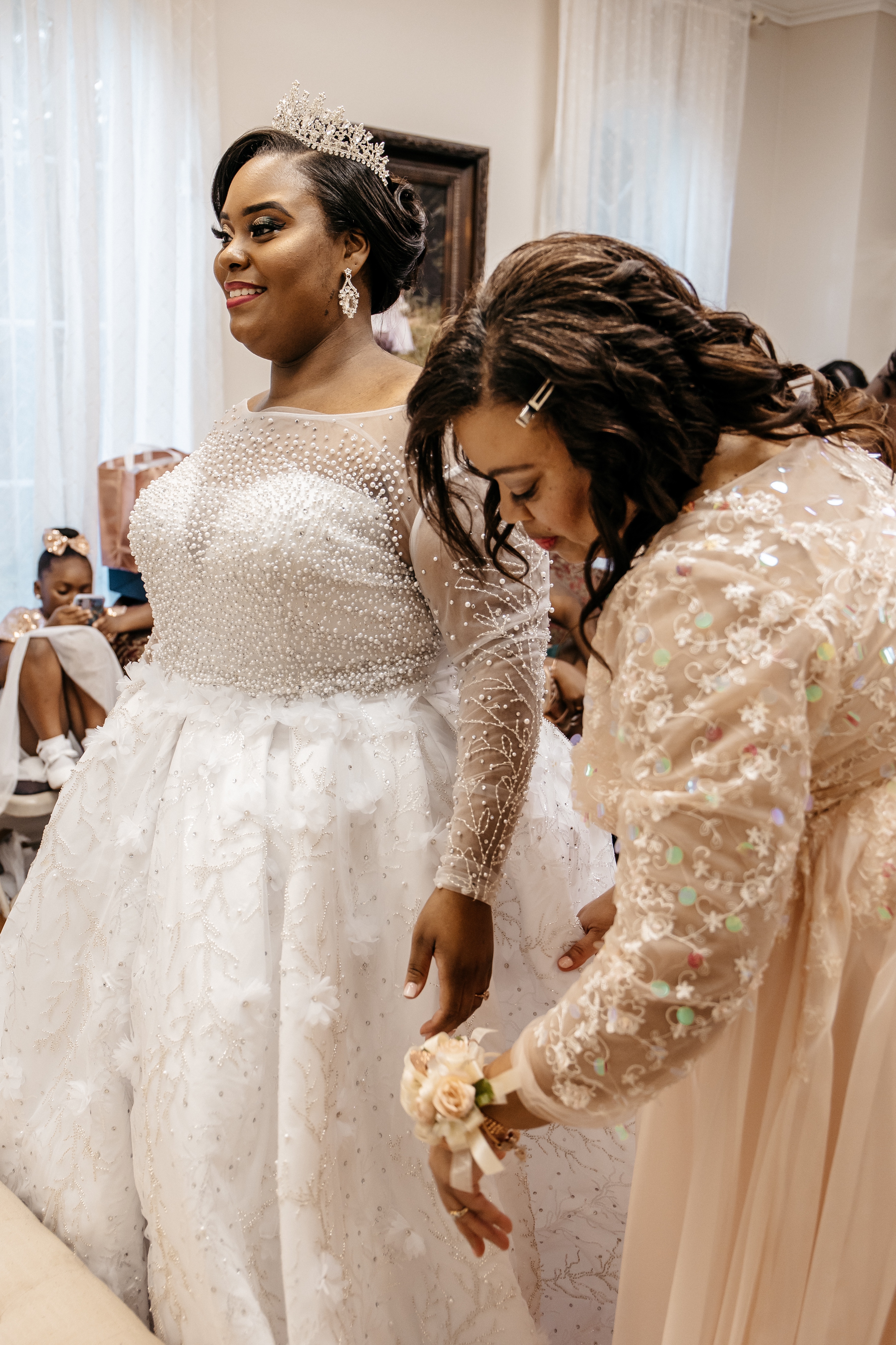 A bride and her mother enjoy time together before her ​micro wedding in north georgia