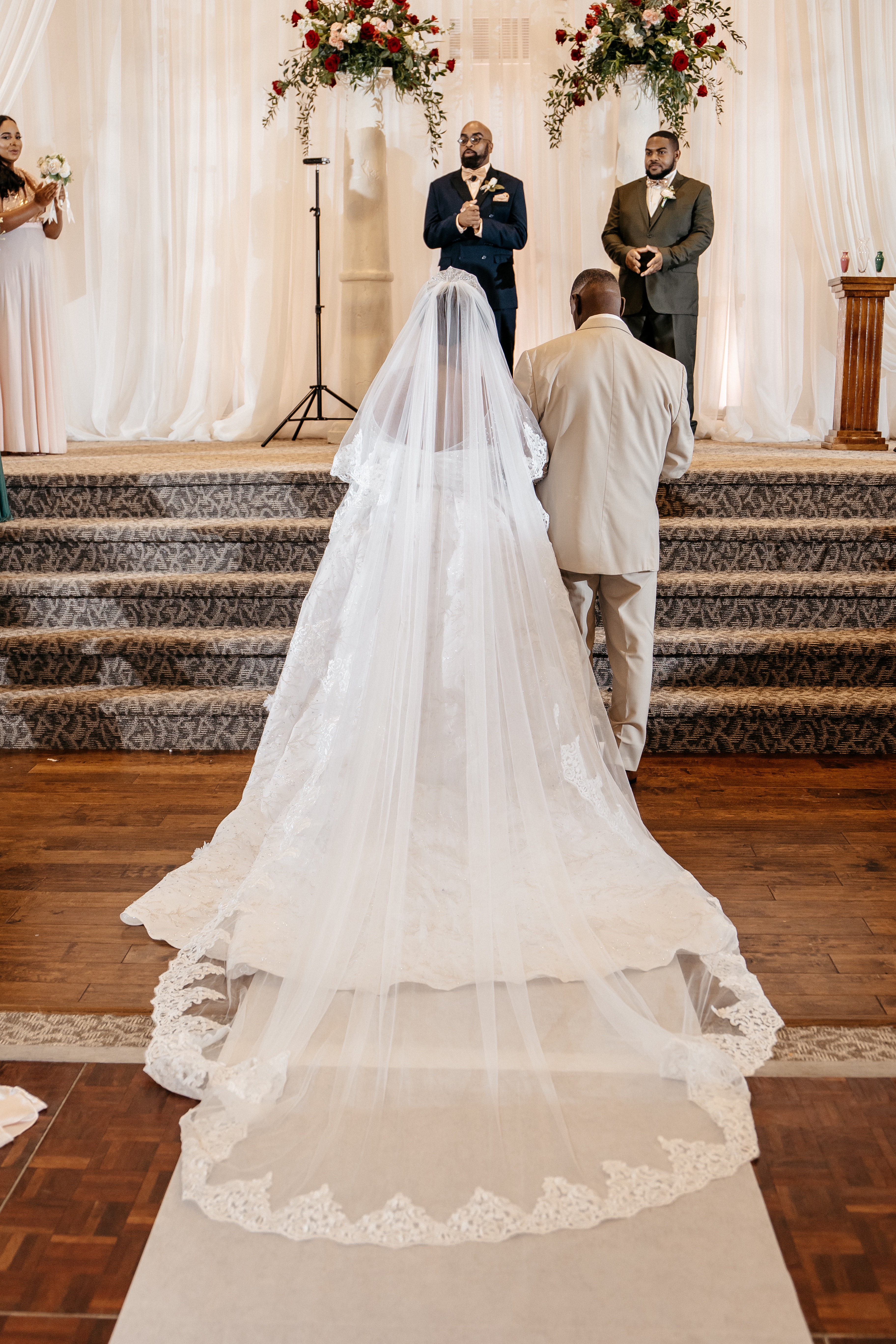 A bride and groom stand at the altar in front of the officiant at their georgia micro wedding
